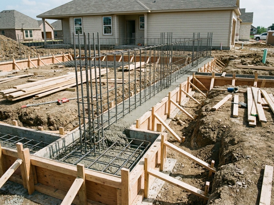 Concrete foundation footings and grade beam in Winnipeg